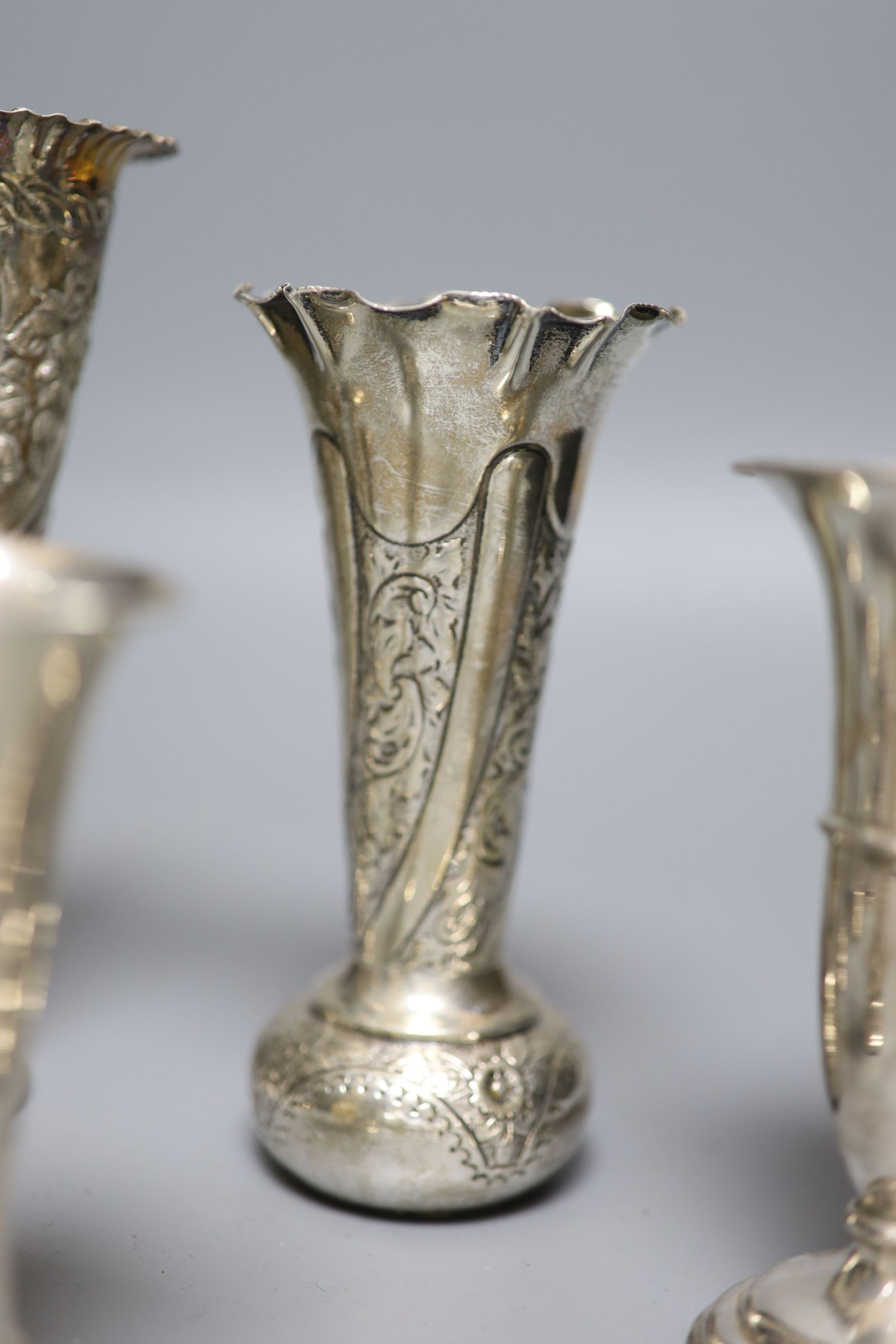 Seven assorted Victorian and later silver posy vases, largest 16.5cm, all weighted.